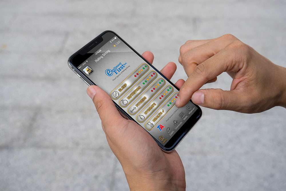 Man&rsquo;s hand using mobile smartphone with green screen