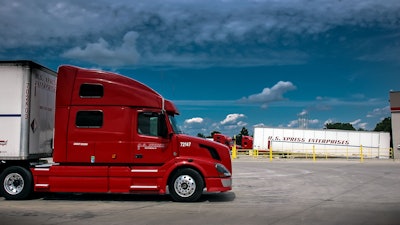 Multiple U.S. XPRESS semi trucks parked