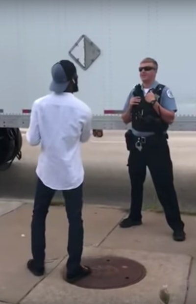 A self-described activist confronts a Chicago police officer about using a truck in a cargo theft sting operation.