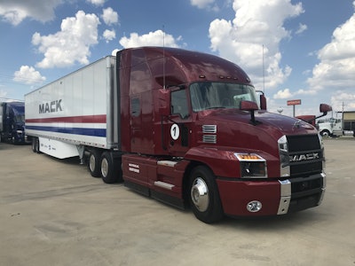 Mack semi truck parked at truck stop