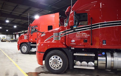 Westcan puts an emphasis on in-house maintenance. Here, in one of the shops at its Edmonton headquarters, two of its new Anthems are receiving Westcan decals.