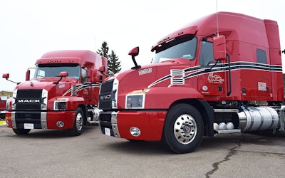 Two of Westcan’s Mack Anthem tractors.
