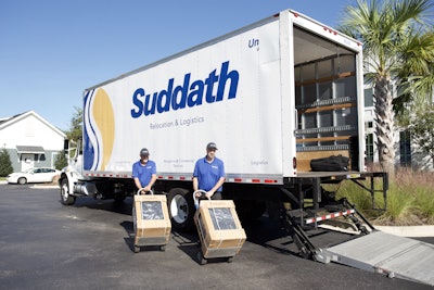 Suddath Relocation & Logistics workers and storage truck