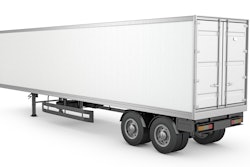 Blank white parked semi trailer