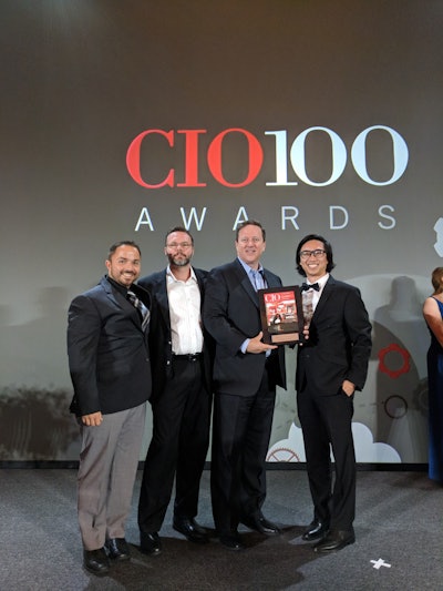 The team that developed Suddath’s Estimator and Tracker platforms were Kosta Pamboukas (left), strategic account manager; Tim Meyer, director, enterprise architecture and engineering; Len O’Neill, CIO; and John Tran, business program manager and the main developer. Another key contributor, not pictured, is Caryn Knill, director of innovation for Suddath.