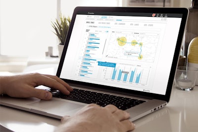 Laptop open with metrics on its screen