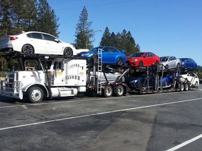 FMCSA has granted an exemption to stinger-steered car haulers from the warning flag requirement for overhanging loads. (Photo from Turbo Auto Transport)
