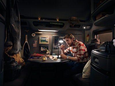 Truck Driver in Cab of Semi-Truck