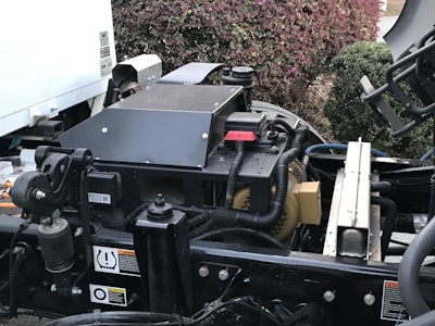 The battery management cradle sits under the cab where a diesel engine would normally be found.