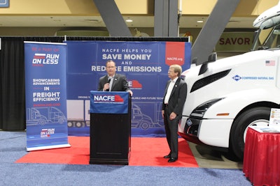 Roeth presenting during NACFE’s press conference today at ACT Expo while Milhelic looks on