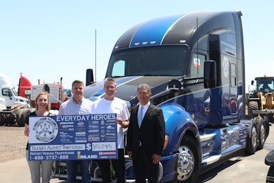 This year’s auction of the Everyday Heroes Kenworth T680 raised $162,000 for TAT, which is the largest donation made to that organization. Shown from left are: Kylla Lanier, deputy director of Truckers Against Trafficking; winning bidder Collin Stewart, president of Stewart Transport; Don Blake, new truck sales manager at Inland Kenworth – Phoenix; and Gilbert Orrantia, director of the Arizona Department of Homeland Security and co-chair Arizona’s Human Trafficking Council.