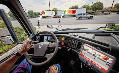 A demonstration of Perceptive Automata’s artificial intelligence tracking and signaling in real-time the likely intention to cross and awareness of two pedestrians near a Volvo VNR 300 heavy-duty truck model. The AI is able to track, in parallel and with a 360-degree field of view, a practically unlimited number of pedestrians, cyclists, and vehicles to enhance professional drivers’ situational awareness in road environments.