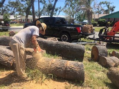 The 2019 Titan XD Pro4X hauled plenty of firewood while towing a tractor.
