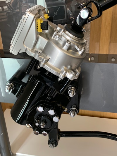 The active steering system features an electric motor (in silver) mounted on top of the standard hydraulic steering gear.