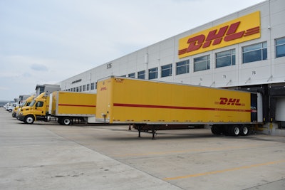 DHL trucks are docked at a DHL Global Forwarding facility near Chicago’s O’Hare airport to deliver imported shipments.