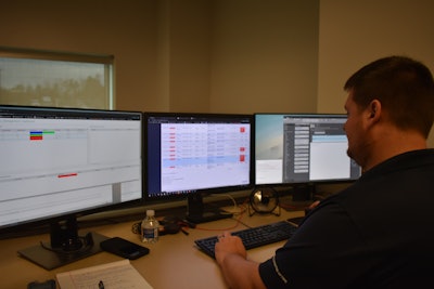 OEMs use telematics to remotely program trucks and engines. Bobby Weisneck, supervises the remote programming and diagnostics team in Volvo’s Uptime Center.