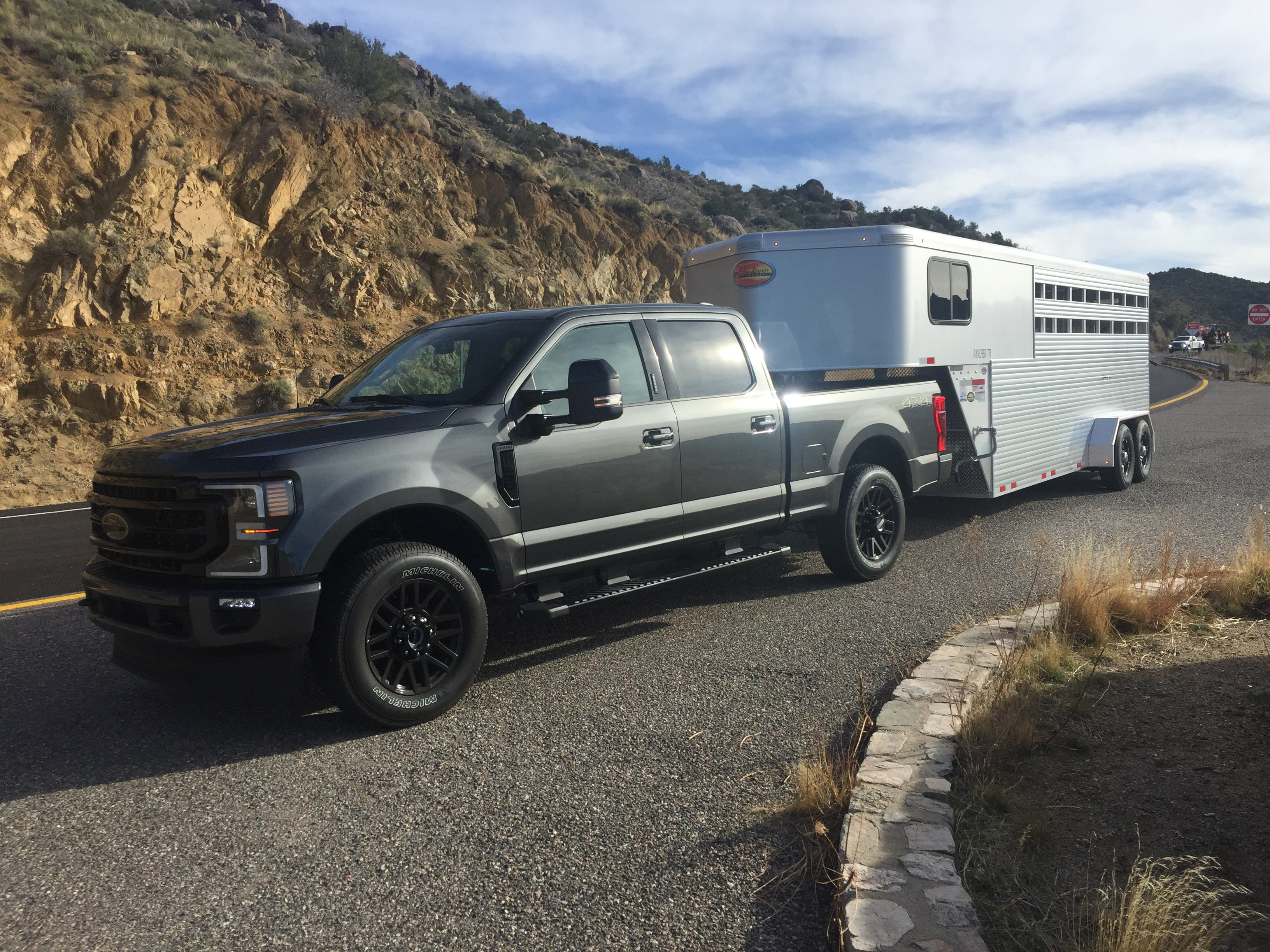 2020 Ford F-250 Lariat hauling a livestock trailer