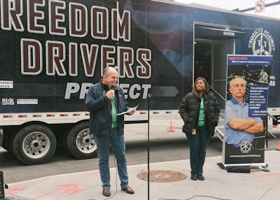 Ray Greer, CEO of Omnitracs, speaks during the event the company hosted for Truckers against Trafficking.