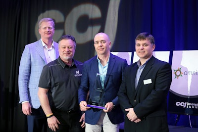 Polaris Transportation Group’s president Dave Cox and chief technology officer Dave Brajkovich (middle) accept the 2020 CCJ Innovator of the Year award from CCJ editors Aaron Huff and Jason Cannon.
