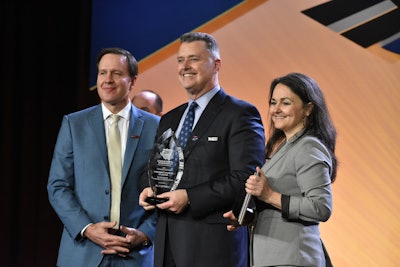 Brent Nussbaum, CEO of Nussbaum Transportation, accepts the top award, large fleet category, in the Best Fleets to Drive For program.