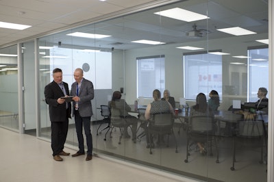 Dave Brajkovich (left) says that PTG President Dave Cox (right) is creating a culture that “allows everybody to lift to the next level. If they want to try something, we say ‘Go for it.’”