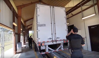 semi-truck undergoing an inspection