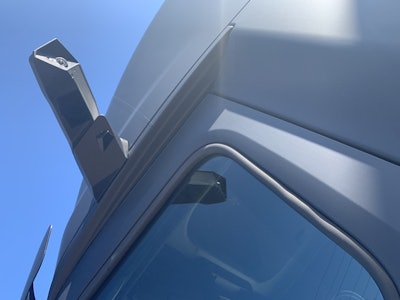 The exterior camera arm can be folded inward by pushing a button inside the cab, and it also has a breakaway feature. In the event of an impact, it automatically closes to protect itself.