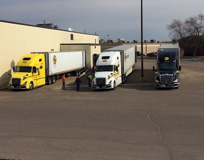 Drivers for Halvor Lines are seen following social distancing protocols at a shipping location.