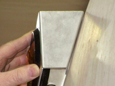 Special double-sided tape from 3M is used to attach the light housing to the rear of the tanker.