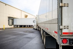 semi trucks at freight loading dock