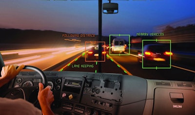 Depiction of advanced camera systems alerting driver to lane keeping and nearby vehicles