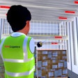 Rendering of an XPO Logistics user moving beams in VR