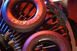 A Goodyear Tire & Rubber Company associate keeps an eye on truck tires traveling through the company’s Danville, Virginia, manufacturing plant as they head toward inspection.