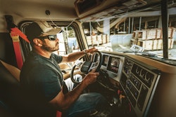 driver inside cab of truck