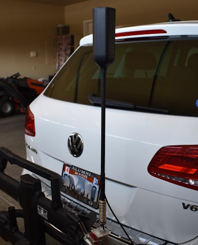 Back view of white Volkswagen with Drive Reach OTR