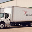 Cardinal Health truck parked at a warehouse dock