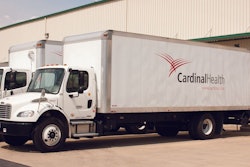 Cardinal Health truck parked at a warehouse dock