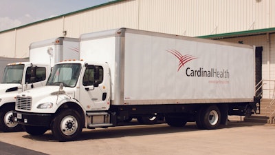 Cardinal Health truck parked at a warehouse dock
