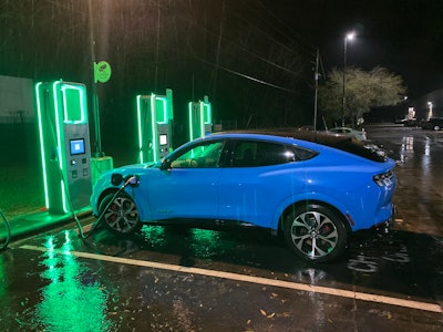 Sergio's all-electric Mustang connected to a charging station