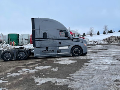 Craig Zeller, owner and founder of Zeller Transportation, still drivers regularly, despite growing the fleet from three trucks to more than 50. This is one of the fleet's Freightliner Cascadias pictured in the recent severe winter weather events in February.