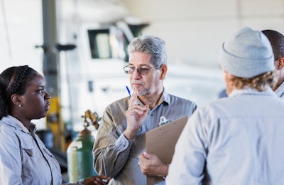 A group of team members discussing work