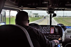 Truck driver in truck cab