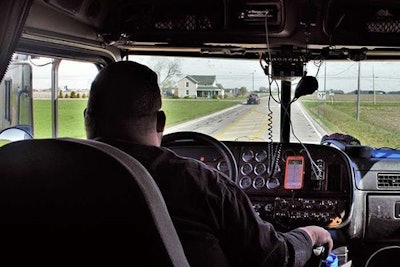 Truck driver in truck cab