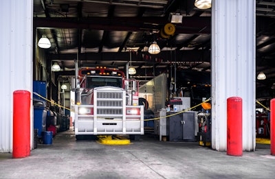 semi truck getting maintenanced