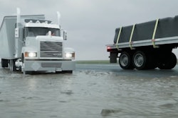 Truck stuck on muddy shoulder