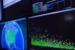 6 computer monitors displaying pixel graphics