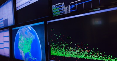 6 computer monitors displaying pixel graphics