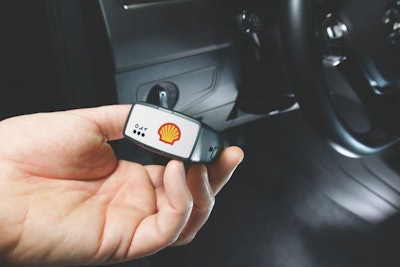 hand holding shell telematics