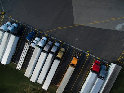 aerial view of parked semi trucks