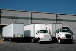 trucks and trailers at a loading dock